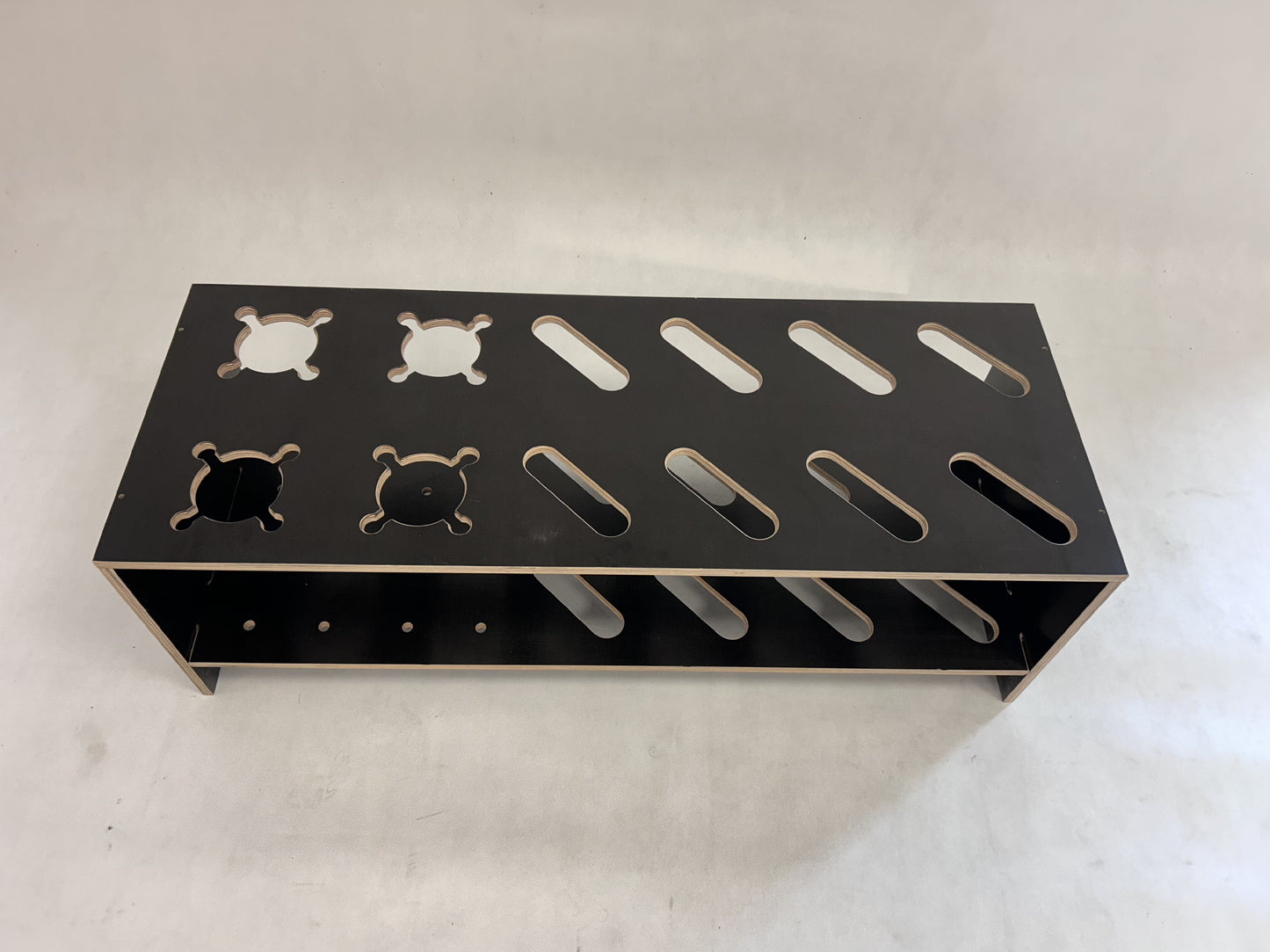 Gecombineerde houten standaard voor ski’s en stokken