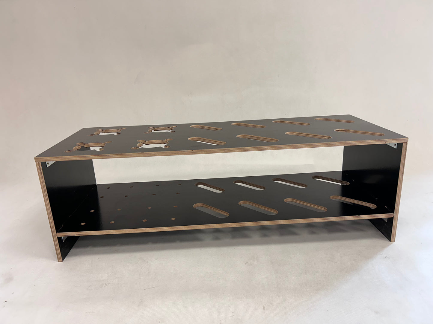 Gecombineerde houten standaard voor ski’s en stokken